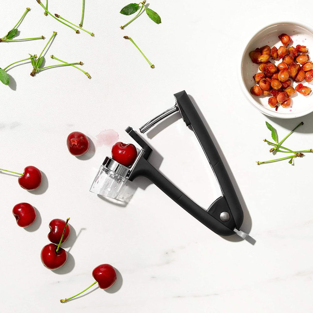 https://www.kooihousewares.com/cdn/shop/files/oxo-kitchen-tools-utensils-oxo-cherry-olive-pitter-30208436404259.jpg?v=1690774034&width=1000